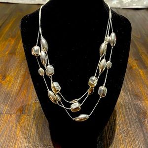 3 strand adjustable necklace. Laid flat 20" length